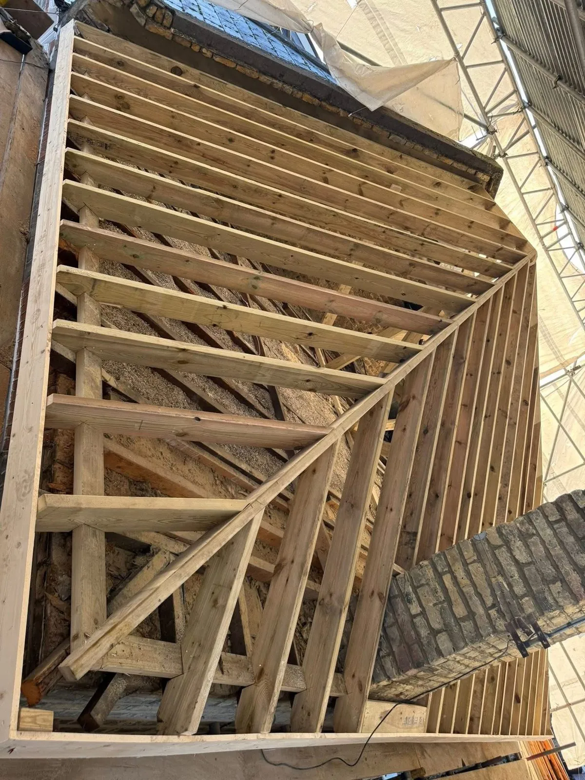 New roof timbers and rafters during a re-roof in Perranporth